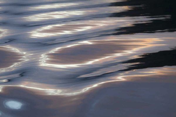 Canada, BC, Sunset on water wave patterns